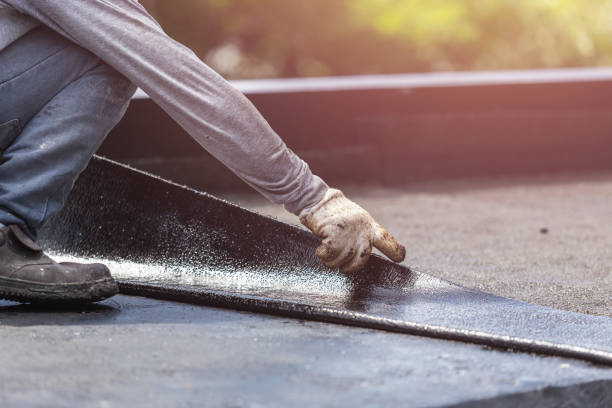 Professional Interior Drainage System technician working in Selden, NY